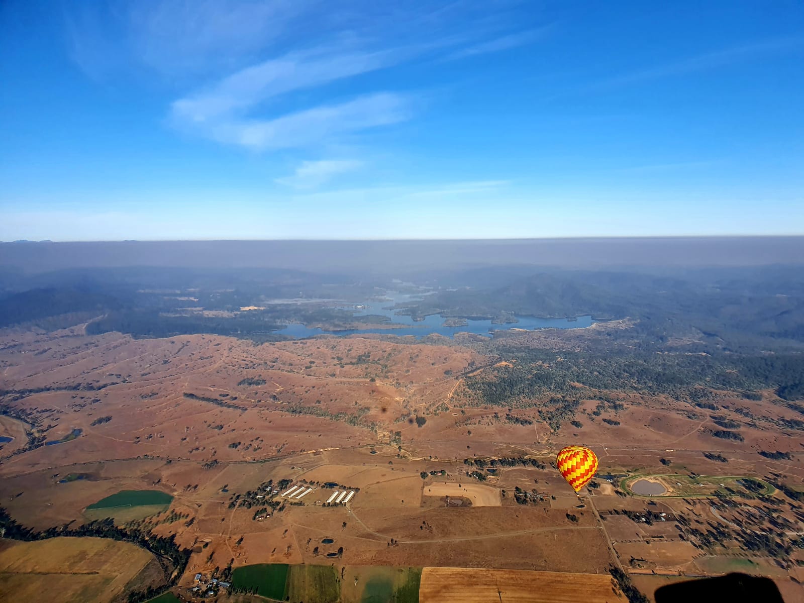 Wide open vistas from a hot air balloon basket.