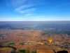 Wide open vistas from a hot air balloon basket.